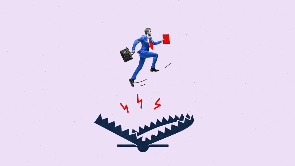 Biznesmen przeskoczył pułapkę na niedźwiedzie z teczką i dokumentami